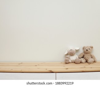 Nursery wall mockup, blank wall for decal, sticker, framed art display, wooden shelf and soft toys, neutral baby room interior, space for text. - Shutterstock ID 1883992219