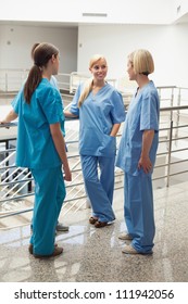 Nurses Speaking In Hospital Corridor, Healthcare Workers In The Coronavirus Covid19 Pandemic