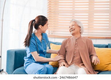 nursing home assistance in health insurance business concept, asian woman doctor or nurse caregiver support health care to elderly senior patient person, caretaker in medicals care recovery service - Powered by Shutterstock