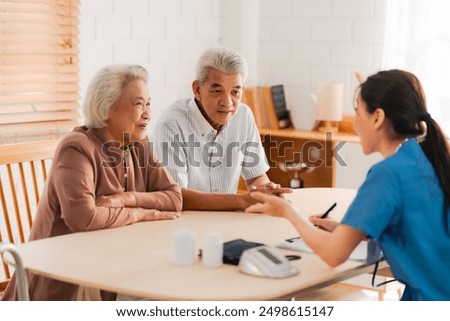 nursing home assistance in health insurance business concept, asian woman doctor or nurse caregiver support health care to elderly senior patient person, caretaker in medicals care recovery service