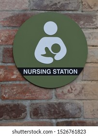 A Nursing Room Sign On The Wall.