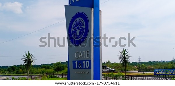 NUST University\
gate no.1 and 10 sign board. This picture is taken on 6th August of\
2020, Islamabad, Pakistan.\
