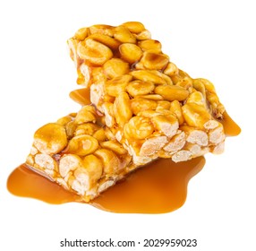 Nut Bar With Peanuts And Melted Caramel Syrup Isolated On White Background. Crushed Muesli Energy Cereal Snack