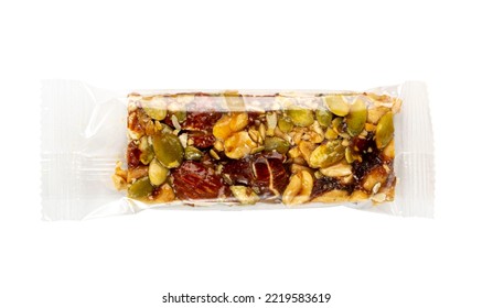 Nut Bar In Plastic Package Isolated, Energy Snack With Nuts, Muesli, Protein Candy Bar, Fitness Fruit And Nut Mix On White Background, Clipping Path