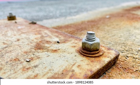 Nut, Bolt, Rust, The nut is rusted. Nut fastening the iron fence to be attached to the ground, outdoor, rust.
