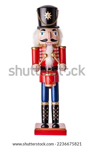 Nutcracker Christmas soldier on white background. Wooden Christmas Room Decoration