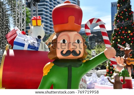 nutcracker holding candy cane with santa claus sleigh polar bear christmas tree and presents - Fiberglass Christmas Decorations nutcracker holding candy cane with santa claus sleigh polar bear christmas tree and presents - Fiberglass Christmas Decorations