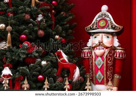 The Nutcracker on the New Year's tree in Moscow. New Year's card 2026. Beautiful Christmas background. Concept of preparing decorations and attire for the New Year.