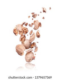 Nutmeg Crushed In The Air Isolated On A White Background