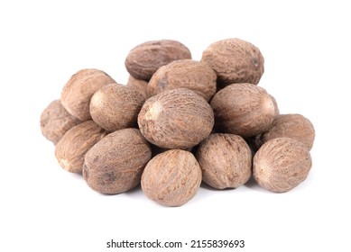 Nutmeg isolated on white background. Nutmeg powder. Nutmeg spice with green leaves.