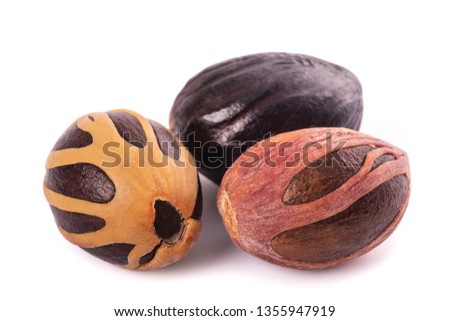 Nutmegs (Myristica fragrans) isolated on white background