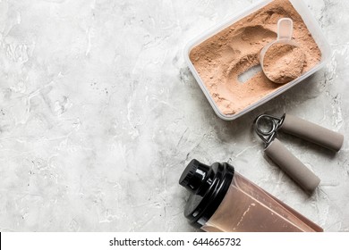 Nutrition For Workout With Protein Cocktail Powder And Bars On Stone Background Top View Mockup