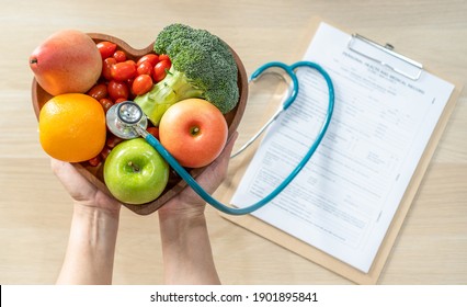 Nutritional Food For Heart Health Wellness By Cholesterol Diet And Healthy Nutrition Eating With Clean Fruits And Vegetables In Heart Dish By Nutritionist And Doctor Recommended For Patient Well-being