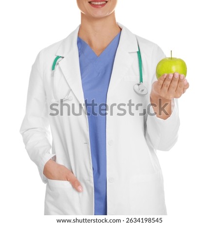 Nutritionist with green apple and stethoscope on white background, closeup