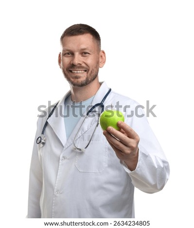Nutritionist with green apple and stethoscope on white background