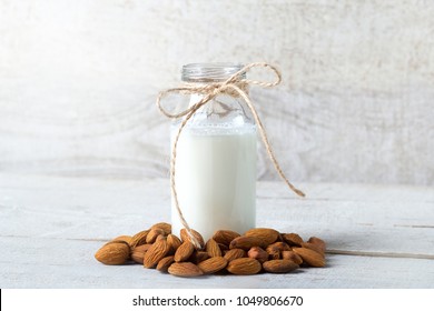 Nuts Almond And Almond Milk White Background