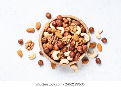 Nuts assortment at white background.