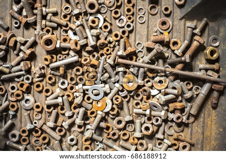 Nuts and bolts closeup on plain background
