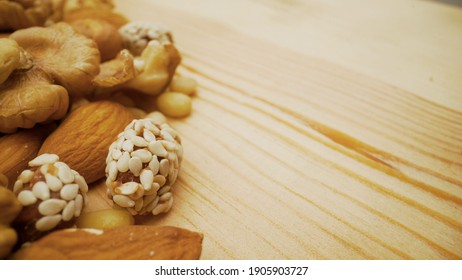 Nuts close up. Organic mixed nuts as background. Natural background made from different kinds of nuts.