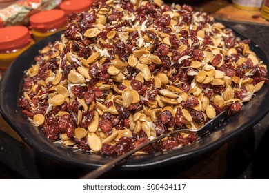 Nuts and cranberries mix for pilaf at farmers market - Shutterstock ID 500434117