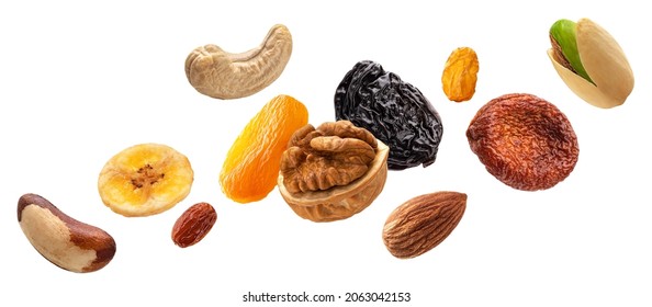 Nuts and dried fruits isolated on white background - Shutterstock ID 2063042153