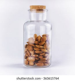 Guy Sits On Glass Jar