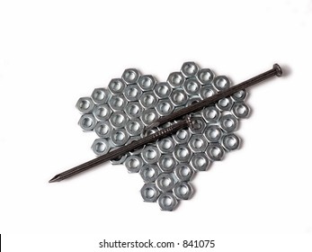 Nuts and nails in the shape of a heart on white background