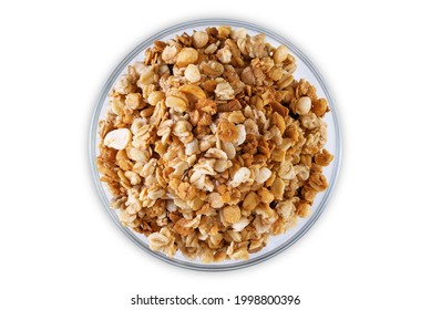 Nuts oatmeal granola on a white isolated background. the toning. selective focus