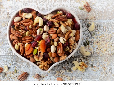 Nuts On Heart Plate. Healthy Eating. Top View