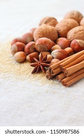 Nuts and spices on sacking background