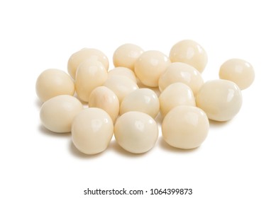 nuts in white chocolate isolated on white background