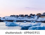 Nuuk city old harbor sunset view with icebergs, Greenland