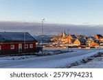 Nuuk city suburb panorama with Inuit houses with sea and the fjord background, Greenland