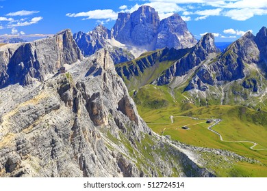 Nuvolau refuge and distant road ascending to Giau pass, Dolomite Alps, Italy