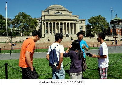 NY - SEPT 3, 2009:  Asian Students Get A Campus Briefing From An Orientation Leader (in Blue Tee-shirt) At Columbia University