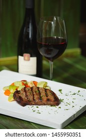 Ny Strip Steak Sprinkled With Herbs Cooked Vegetables