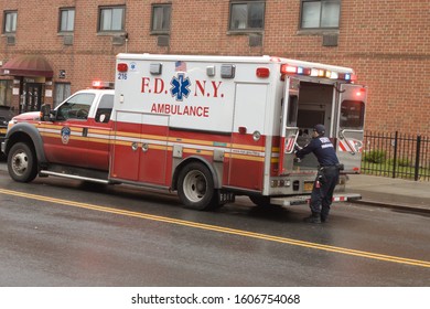 NYC Fire Dept Ems With Gurney, A Wheeled Stretcher Used For Transporting Hospital Patients In The Bedford Stuyvesant Section Of Brooklyn NY January 5 2010