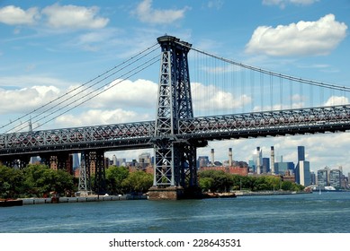 NYC - July 19, 2009:  The Williamsburg Bridge over the East River connects Manhattan to the Williamsburg district in Brooklyn