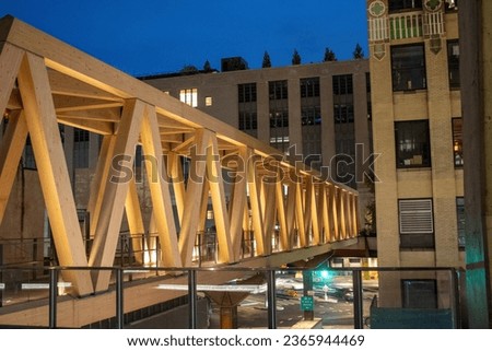 NYC Manhattan bridge picture of wooden crosser at night.