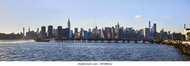 NYC Manhattan island from Green point, clear sky late day panorama
