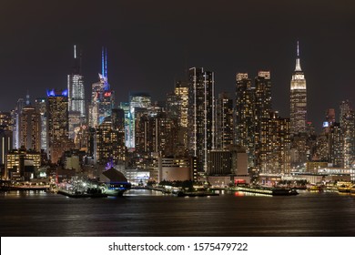 NYC, NEW YORK - SEPTEMBER 23, 2019:  NYC Skyline at Night with Skyscrapers in Background. Long Exposure Photo Shoot. - Shutterstock ID 1575479722