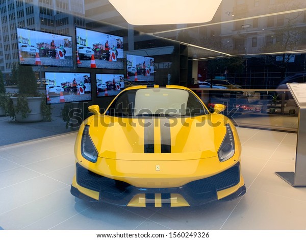 NYC, Park Ave. , NY/USA - November 14,\
2019:Ferrari Shop.  It is situated on the corner of Park Avenue and\
55th street, with windows on Park Avenue. A prime Midtown Manhattan\
location off Park Avenue.