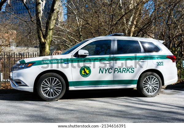 NYC Parks\
park ranger plug-in hybrid ev vehicle parked outdoors in Central\
Park. - New York, USA - February,\
2022
