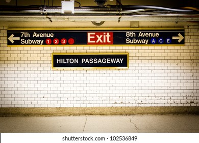 NYC Penn Station subway directional sign on tile wall