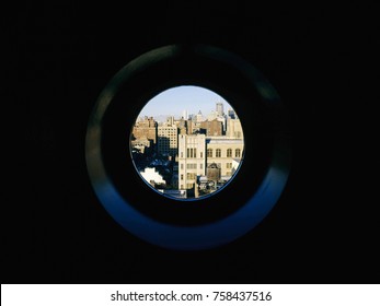 NYC Skyline From A Circular Window