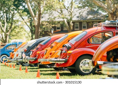 NYC, USA - AUGUST 25, 2013: Retro Styled Image Of A Row Of Vintage Volkswagen Beetles From The NYC Volkswagen Traffic Jam On August 25, 2013 In NYC, USA.