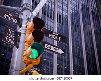NYC Wall Street Yellow Traffic Light Black Pointer Guide One Way Green Light To Right Way, No Turn No Way To Wrong. Right Way Concept. Best Choice, Right Choice. Wall Street Traffic Light Concept