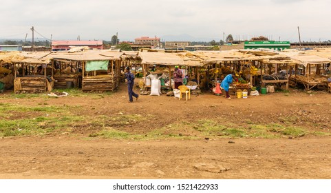 Nyeri-Nanyuki Road, Kenya – June 20th, 2019: Street Photograph Of Typical Large Kenyan Market Found On-side Of The Nyeri – Nanyuki Road (A2).