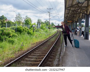 Nykoping C, Sweden -June, 2021: Tourist On Platform For The Train Station Of Nyköping C,. Södermanland Region, Scandinavia. North Europe.