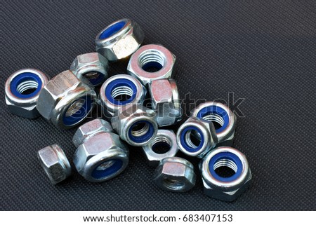 Nylon locking nuts. Horizontal image with copy space.